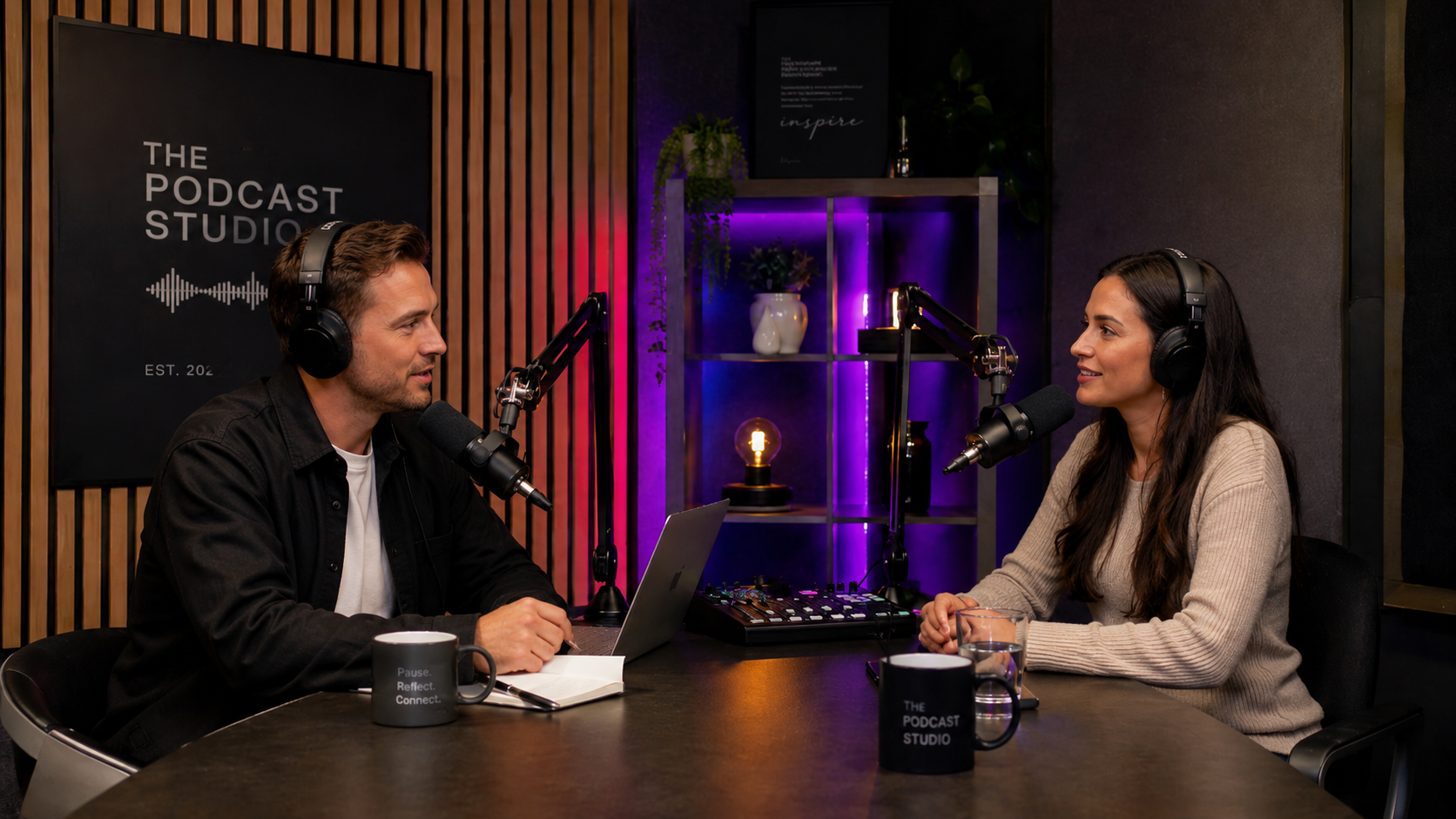 Two podcast hosts discussing the guide in a studio